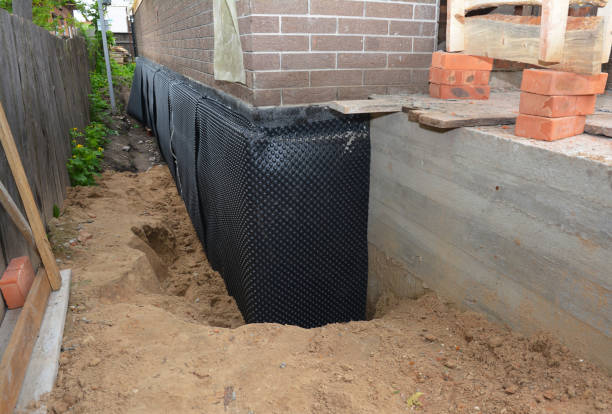 SJ Waterproofing Pros technician performing targeted Vapor Barrier Installation assessment in Gainesville, GA